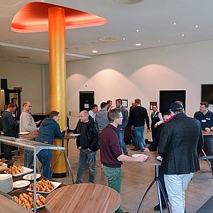 Teilnehmer beim Austausch in der Kaffeepause