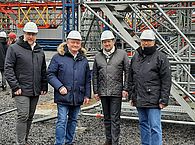 Hermann Gröhe gemeinsam mit Peter Kahl, Marcus Nachbauer und Carsten Burckhardt im Ausbildungszentrum